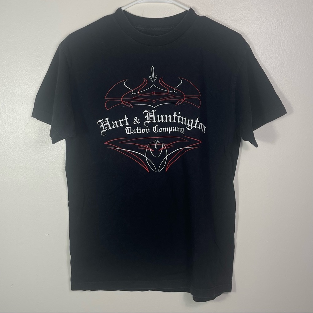 Hart & Huntington Tattoo Co. men's t-shirt featuring a graphic logo